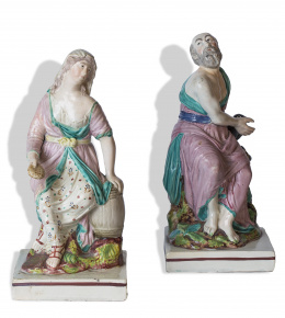 766.  “Elias y la mujer que le dio de comer”. Pareja de grupos en porcelana Pearlware de Staffordshire, atribuidos a Enoch Wood, h. 1810. Marcas de “G” en las dos bases.