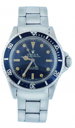 828.  Reloj ROLEX OYSTER PERPETUAL SUBMARINER 200-M o 660 ft en acero. Ref 5513 año 1966. Brazalete Oyster del año 1970.