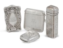 687.  Lote de cuatro cerilleros de plata. Formado por: Uno cuadrado con iniciales "HEA" grabadas, con marcas, Birminhgam, 1912; uno de plata sterling repujada con iniciales grabadas; uno con decoración grabada y mecanismo para encender la cerilla; y otro con personaje y conejos.Principios del S. XX.