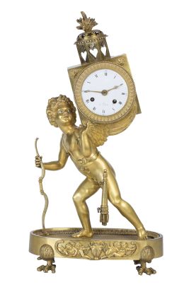545.  Reloj Luis XVI con Cupido en bronce dorado.
Trabajo francé