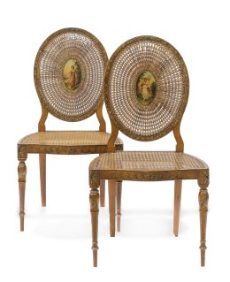 1268.  Pareja de sillas eduardinas de madera de satín con asiento y respaldo de rejilla.Trabajo inglés (1901-1910).