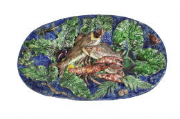 934.  François Maurice (1846 - 1896).Bandeja ovalada de engaño de cerámica esmaltada, en el estilo Palissy.Francia, último tercio del S. XIX.