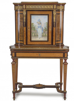 547.  "Bonheur du Jour" de estilo Luis XVI, de madera de satín, "birdseye maple", marquetería de varias maderas y teñida, bronces aplicados y placa de porcelana esmaltada.Trabajo francés, h. 1890.