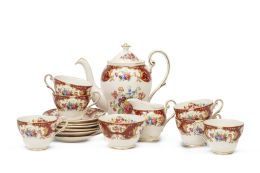 649.  Juego de té de porcelana esmaltada modelo "Lady Fayre" con decoración floral y filo dorado.Royal Standard, Inglaterra, segunda mitad del S. XX.