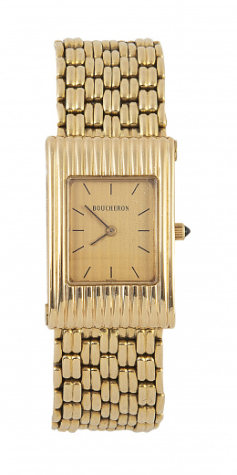 453.  Reloj de pulsera de señora BOUCHERON Reflect. AB 06448 en oro amarillo de 18K, con pulseras adicionales de piel