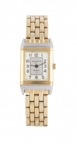 456.  Reloj pulsera JAEGER LE COULTRE Reverso en oro de 18K con marco de caja y base en acero