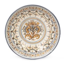 1058.  Cuenco de cerámica esmaltada con decoración de guirnaldas y ramos.Talavera, S. XIX.