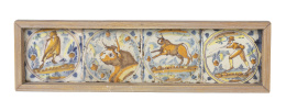 500.  Panel de cuatro azulejos de cerámica esmaltada en ocre, azu