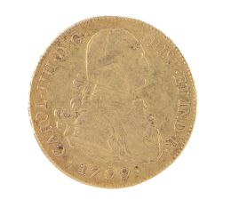 329.  Moneda de 8 escudos de Carlos IV. 1799 en oro. Bolivia. PP.