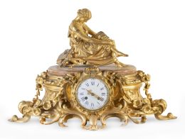 1291.  James Pradier (1790-1852).
Reloj de bronce dorado con dama