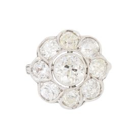 293.  Sortija rosetón de brillantes de talla antigua con brillante central de 0,90 ct aprox