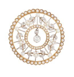 59.  Broche circular Belle-Époque, de perlas y brillantes de tal