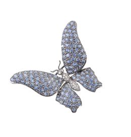 239.  Broche mariposa con alas cuajadas de zafiros azules y cuerp