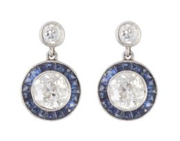 365.  Pendientes ojo de perdiz con brillante central de 0,90 ct a