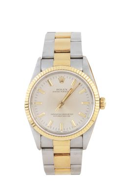 453.  Reloj de pulsera ROLEX Oyster Perpetual Date en oro y acero