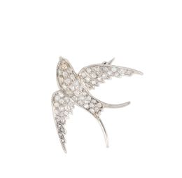 359.  Broche golondrina de pp. S. XX cuajado de diamantes