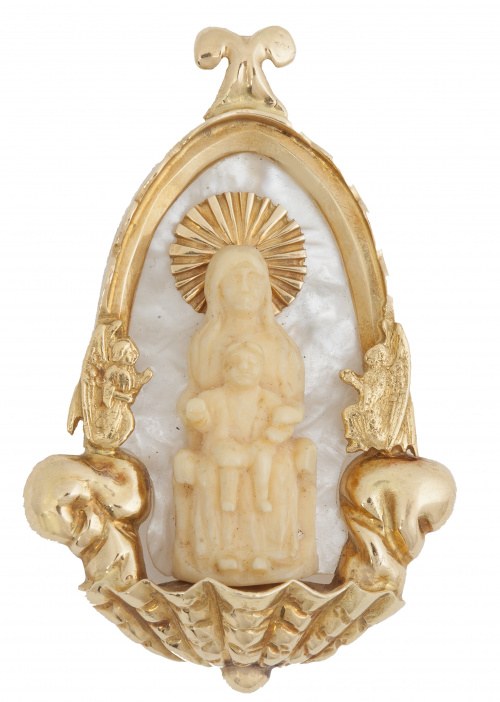 Medalla colgante de pp. S. XX con Virgen y Niño en marfil e