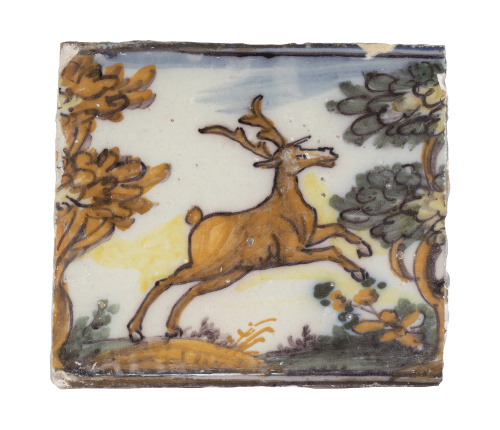 Azulejo de cerámica esmaltada con ciervo en paisaje.Trian