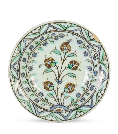 Plato Iznik de cerámica esmaltada con decoración floral.T