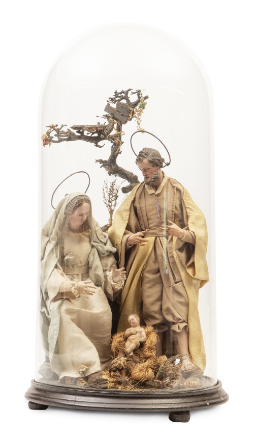 Nacimiento con San José, la Virgen y el Niño.Figuras de b