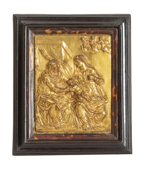 La Virgen con el niño y Santa Ana.Placa en bronce dorado.