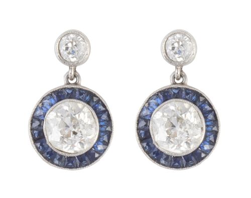 Pendientes ojo de perdiz con brillante central de 0,90 ct a