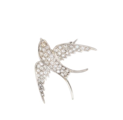 Broche golondrina de pp. S. XX cuajado de diamantes